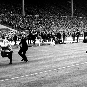 Everton's Unforgettable FA Cup Final: A Fan's Defiant Moment Amidst Three Policemen (1966)