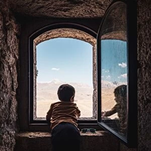 Little boy at the window