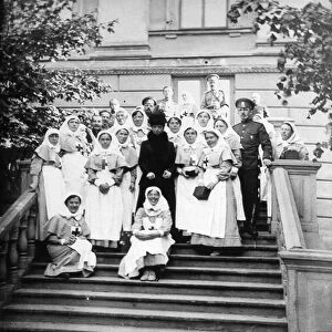 Dowager Empress Maria Feodorovna of Russia with nurses outside a hospital, Russia, 1916