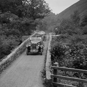 MG M type crossing Figle Bridge during a motoring trial, Devon, c1930s. Artist: Bill Brunell