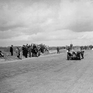 Riley Imp 2-seater of CA Richardson competing in the RSAC Scottish Rally, 1934. Artist