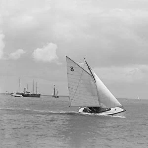 Sailing dinghy Flutterell, 1922. Creator: Kirk & Sons of Cowes