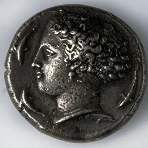 Silver tetradrachma from Syracuse (obverse: a goddess with dolphins), 5th-4th century BC