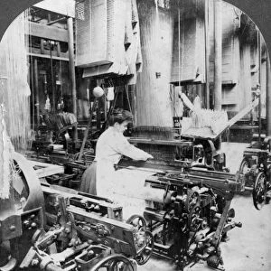 Weaving linen fabric, Montreal, Canada, early 20th century. Artist: Keystone View Company