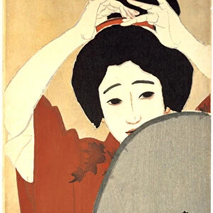 Woman Adjusting Her Hair in Front of the Mirror, 1930. Artist: Kitano Tsunetoni