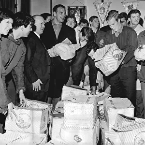 Cardiff City FC players receiving their Christmas turkeys 1964