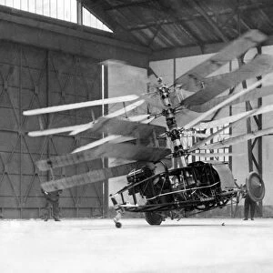 The Pescara helicopter making an experimental flight in a hangar