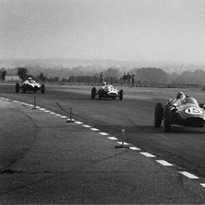 1959 Silver City Trophy: Klass Twisk, 16th position, leads Dick Gibson, 14th position and Jack Brabham, 2nd position, action