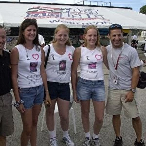 Cristiano da Matta and Tony Kanaan pose with some of their fans at the Motorola 220 at Road America