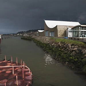 The Columbia River Maritime Museum Sits On The Banks Of The Columbia River; Astoria, Oregon, United States Of America