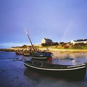Roundstone, Connemara, County Galway, Ireland; Boats In Harbour With Rainbow