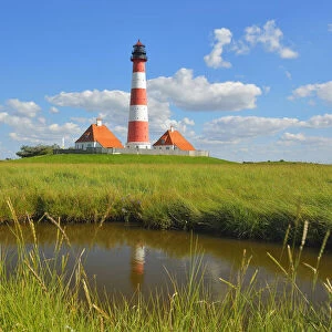 Westerhever Lighthouse Reflected in Pond in Summer, Westerhever, Tating, Schleswig-Holstein, Germany