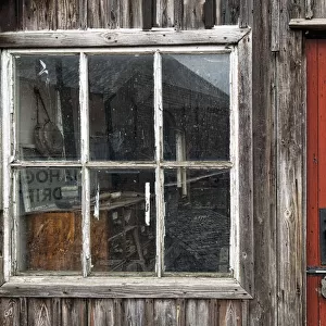 Wooden Building With Red Painted Door, Padlock And Window; Beamish, Durham, England