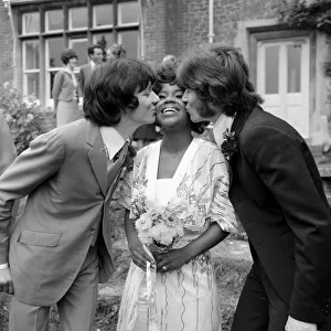 American Pop singer P. P. Arnold receives a kiss from her new husband
