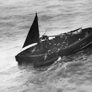 A boat in trouble off the West Coast of England. The boat has the numbers CY613 or