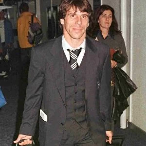 Chelsea and Italy footballer Gianfranco Zola arriving at Heathrow airport after England