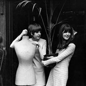 Cilla Black (holding tailors dummy) and Cathy McGowan (with potted plant
