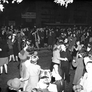 Dancing in Warwick Road, Coventry on VE Day evening. 8th May 1945