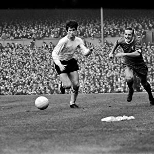 Derby v. Liverpool. Ron Webster and Peter Thompson battle for the ball