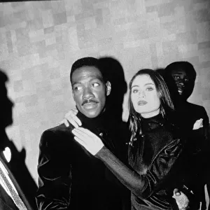 Eddie Murphy Actor / Comedian with actress Charlotte Lewis star of the Golden Child