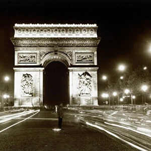 France Paris August 1960 Arc De Triomphe shot from Champs Elysees at night