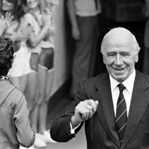 Manchester United 2 v. Stoke City 0. Division 1 Football. Sir Matt Busby waves to fans