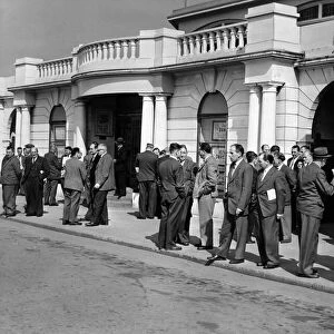 Miners wait outside of the Pavilion at Porthcawl, for the annual NUM South Wales miners