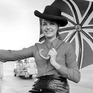 The "Miss World"contestants arriving at Heathrow Airport to take part in