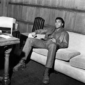 Muhammad Ali aka (Cassius Clay) relaxing in his suite at the Piccadilly Hotel London