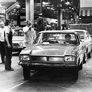 A new Ford Capri car rolls off the production line at the Ford Motor plant in Halewood