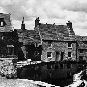 The Old Mill Pond Swanage, Dorset. Note the old chimney built on to the cottage in