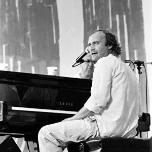 Phil Collins perforing at the Live Aid concert in Philadelphia, USA. 13th July 1985