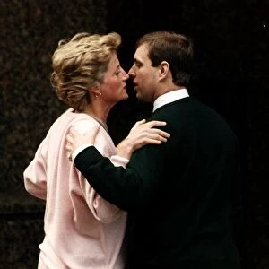 Princess Diana kissing Prince Andrew March 1990