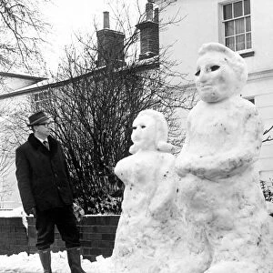 These two snowmen appeared in Railway Terrace, Rugby, apparently created by men from