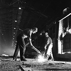 Steelworkers operating one of the open hearth furnaces at the Stocksbridge Steelworks