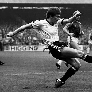 Steve Coppell of Manchester United in action against West Ham United, circa 1980