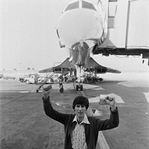 Uri Geller at London Airport standing in front of a Concorde. 1st November 1978