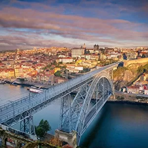 Porto, Portugal. Aerial cityscape image of Porto, Portugal with the Douro River and the Luis I Bridge during sunrise