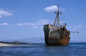 GREECE, Peloponnese Shipwreck in shallow water next to sandy beach GREECE, Peloponnese Shipwreck in shallow water next to sandy beach