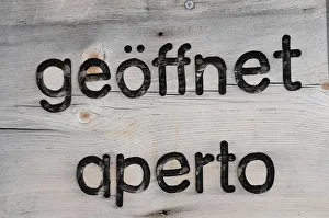 Italy, Trentino Alto Adige, Valle Lunga, Open sign in German & Italian Italy, Trentino Alto Adige, Valle Lunga, Open sign in German & Italian